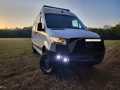 Modular bike rack installed on an OZK overland rig — built for rugged terrain and flexible loadouts.
