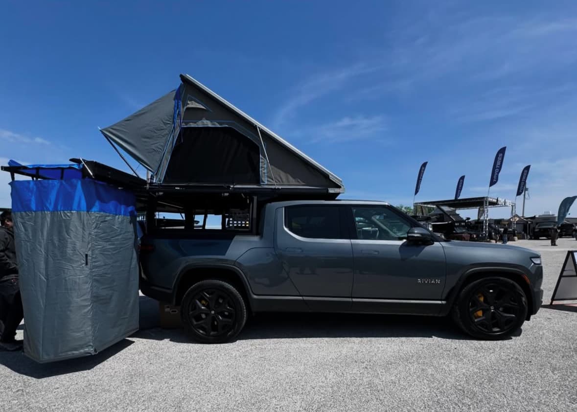 Rooftop tent system mounted to a custom OZK cargo platform — built for camp setups, families, or gear-heavy groups.
