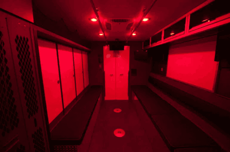 Specialty lighting and layout inside a custom-built OZK van for commercial or municipal field use.
