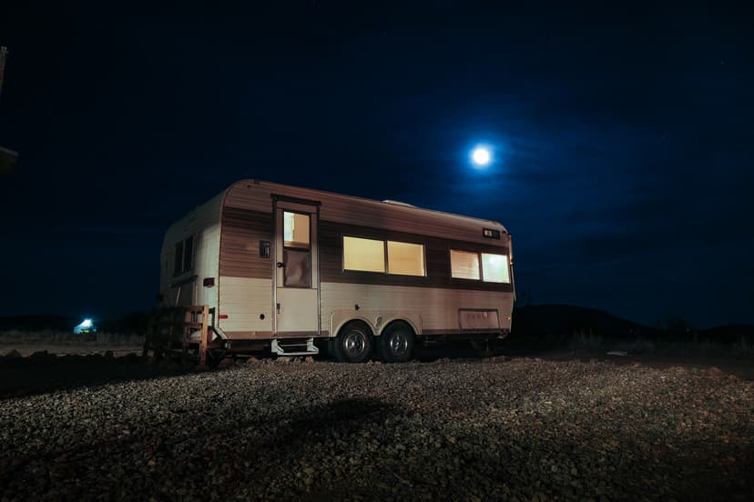 OZK enclosed camper trailer with kitchen and sleeping space
