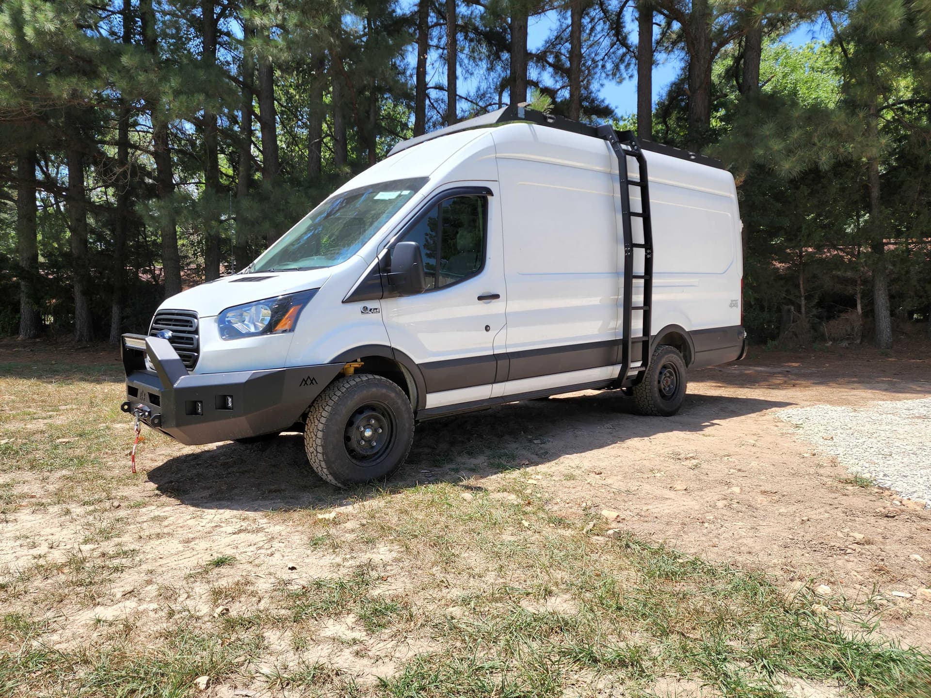 OZK van build with roof rack — perfect for permanent Starlink mounting.