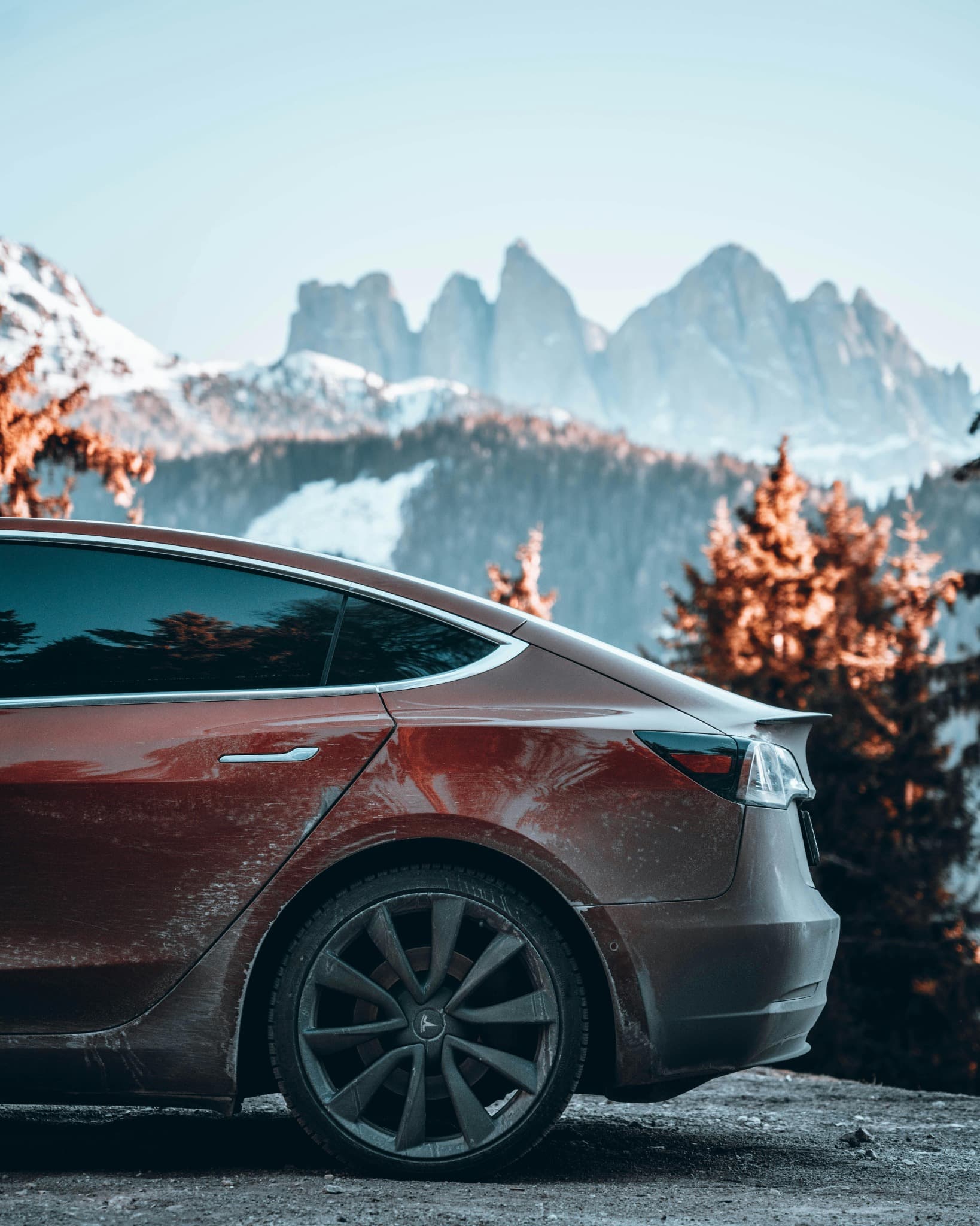 Tesla Model 3 post-adventure, featuring OZK wheels and trail-ready upgrades built to go beyond the pavement.