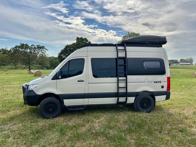 OZK Mercedes Van with ladder and roof unit installed