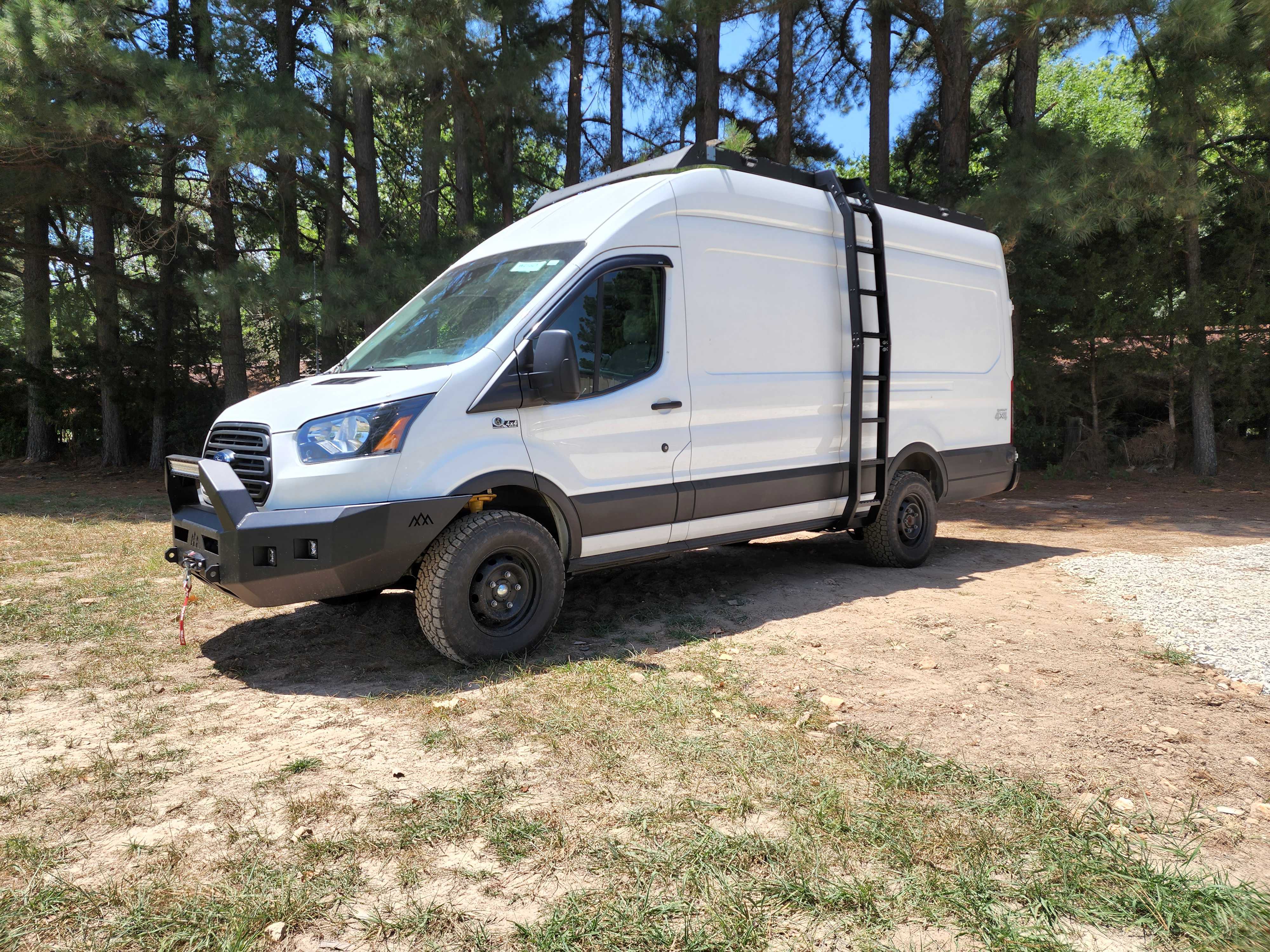 Custom off-grid adventure van build by OZK Customs, designed for national park tours and backroad exploration.