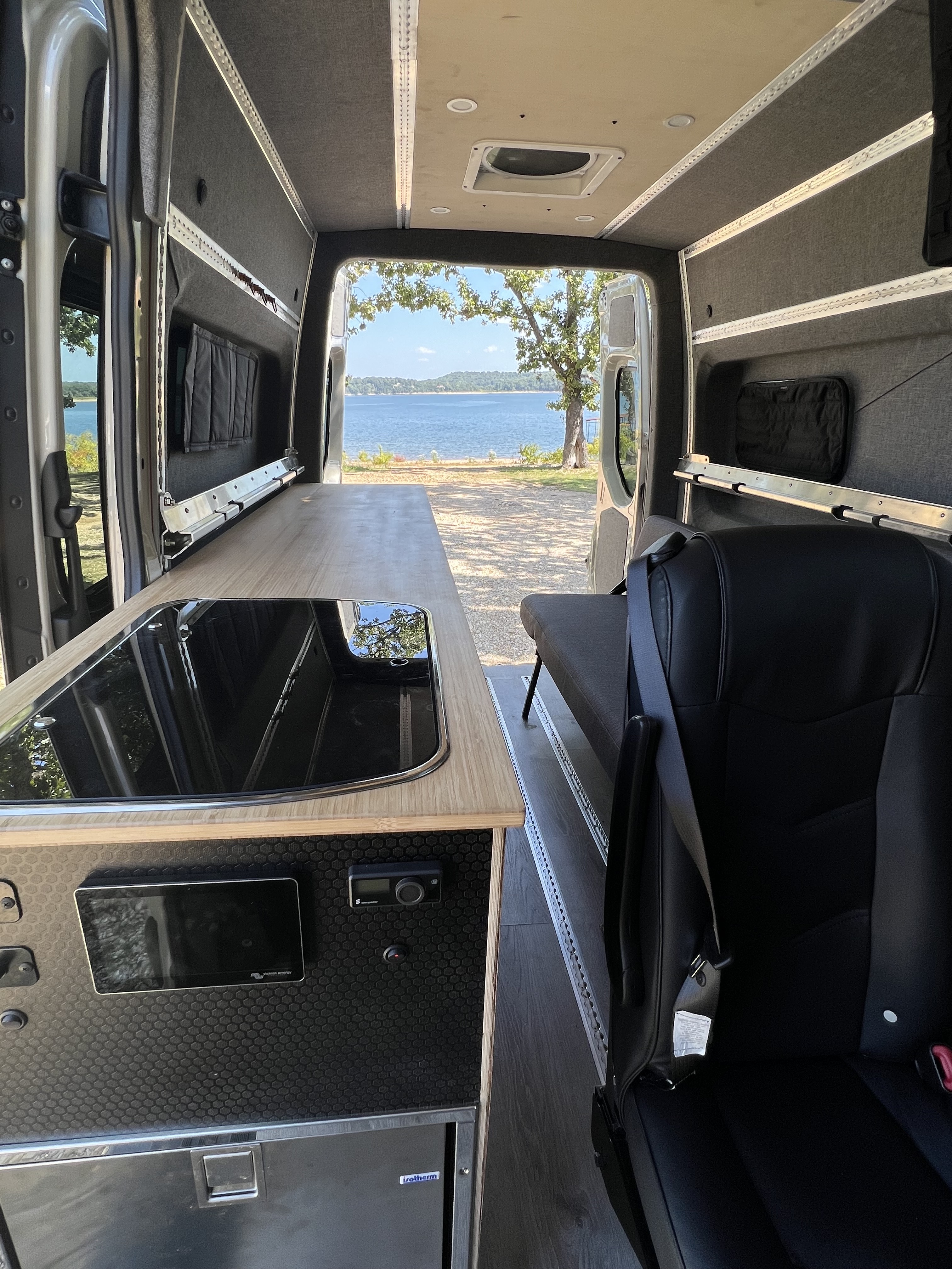 In-progress layout during a camper van custom build at OZK — designed around real usage and gear requirements.