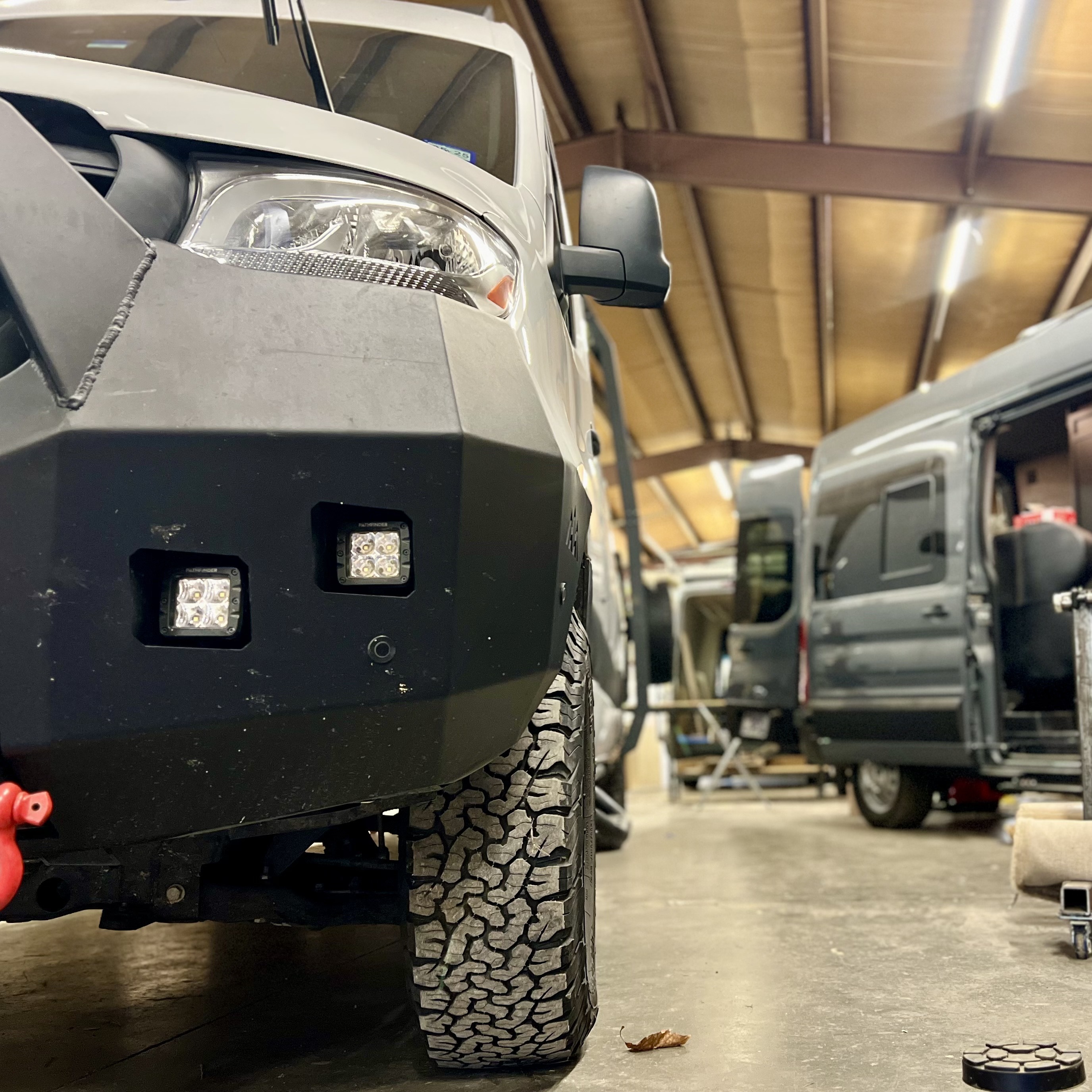 OZK workshop in progress building out multiple van platforms.