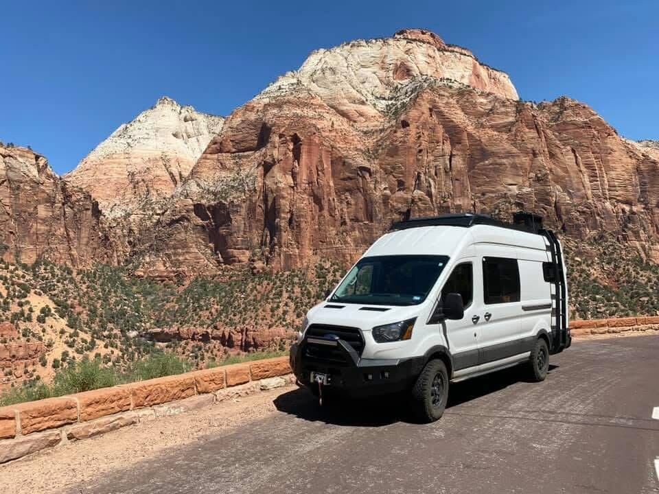 Mercedes Sprinter custom camper van build in the wild.